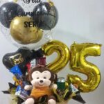 Arreglo de globo y dulces